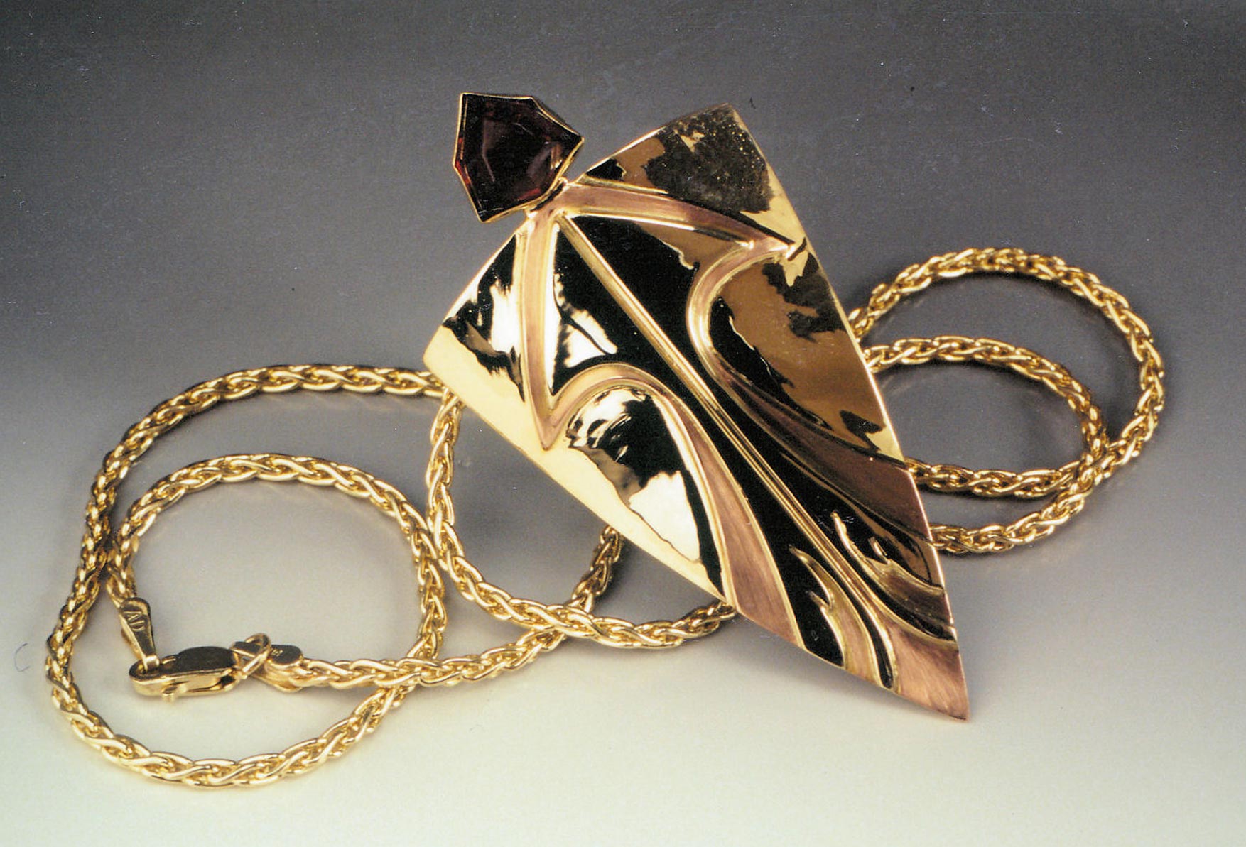 Firebird gold pendant